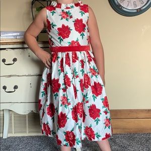 Red and white floral tea-length garden dress